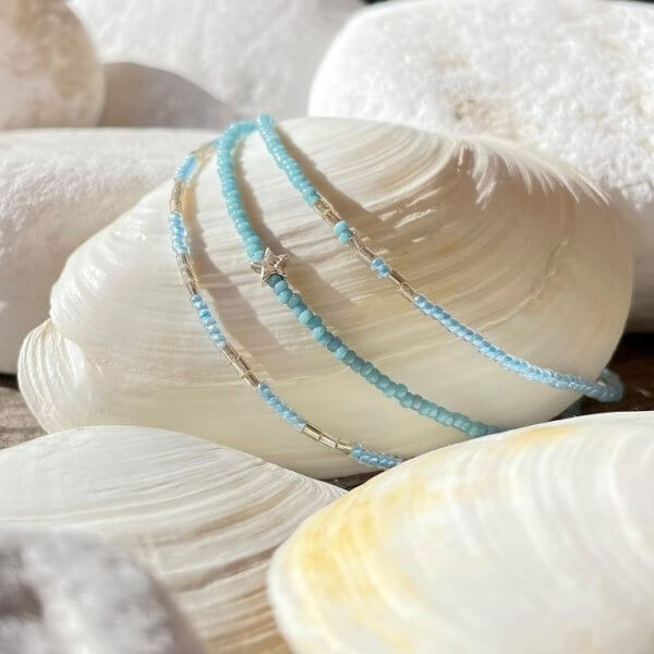 St. Tropez armbandset lichtblauw minikraal en sterretje - Afbeelding 4