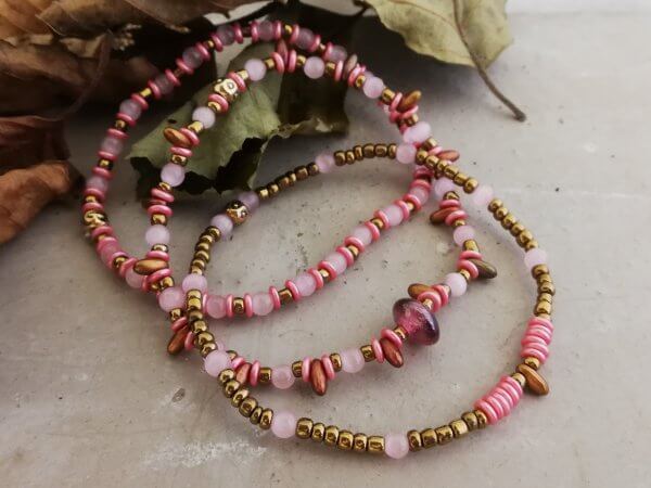 Armbandset roze brons