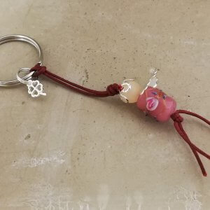Sleutelhanger beschermelfje oudrose met roos