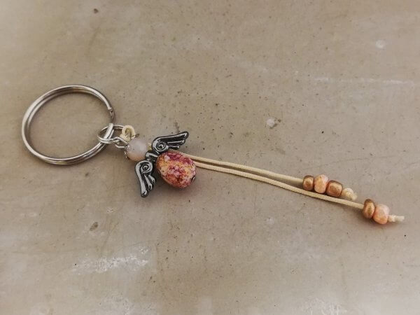 Sleutelhanger beschermengel ovaal oudrose goud