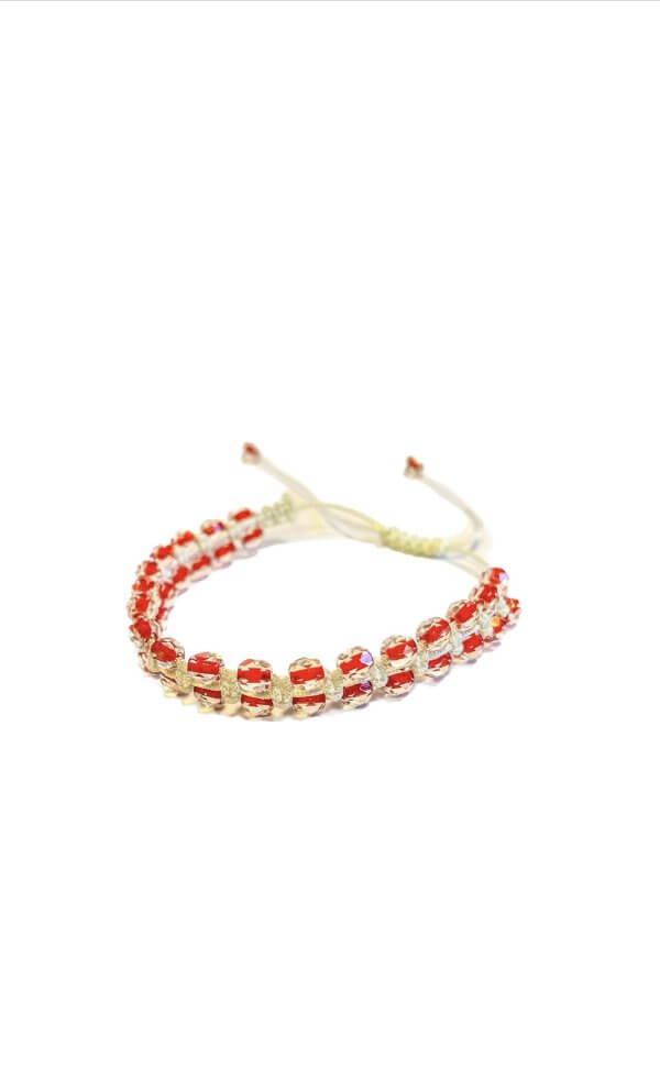 Armbandje wit met rode kralen