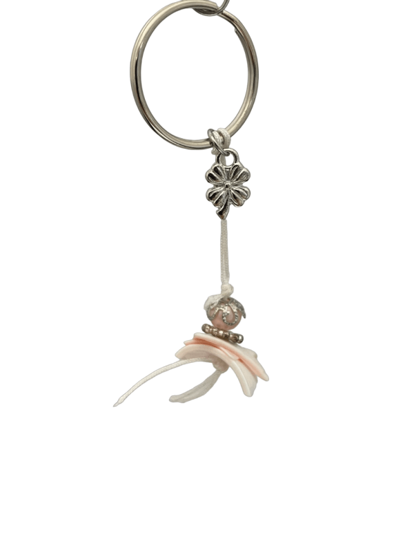 OPRUIMING sleutelhanger schelp zacht roze