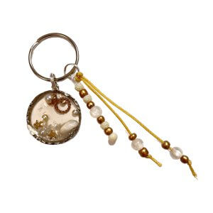 Zomer sleutelhanger schelp parel goud