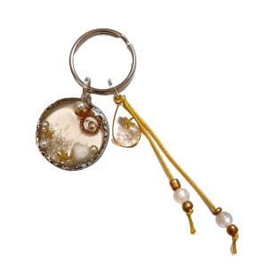 Zomer sleutelhanger schelp parel goud bedel