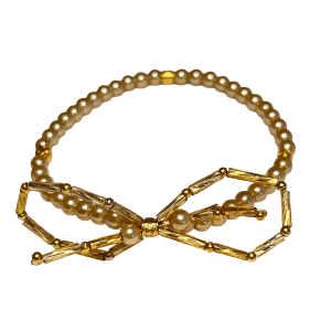 Licht gouden parellook armband met strik