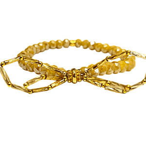 Licht gouden armband met strik
