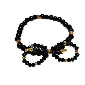 Zwarte armband met strik en gouden accenten